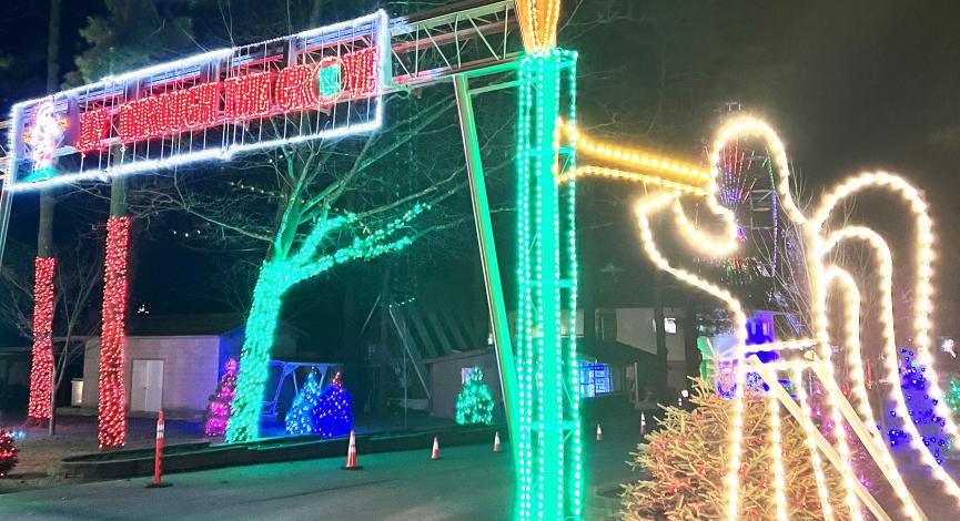 Lighted entry gate to Knobels Joy Through the Grove
