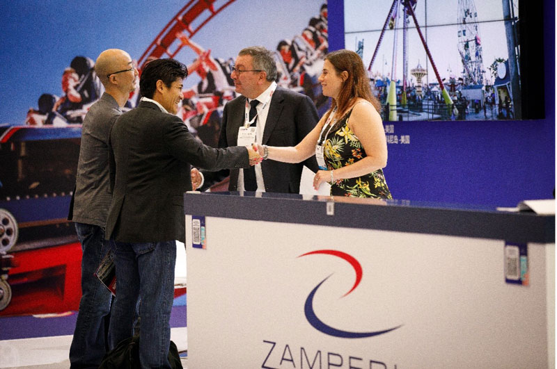Companies interact with shoppers on the iAAPA Expo Asia show floor