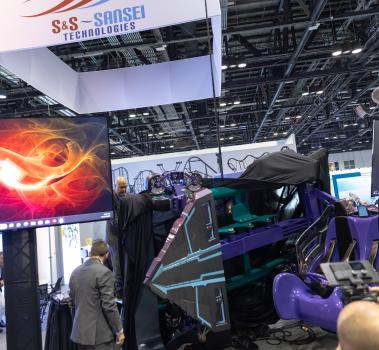 Curtain reveal for Transformers-themed axis coaster train from S&S Worldwide and SEVEN at IAAPA Expo 2023