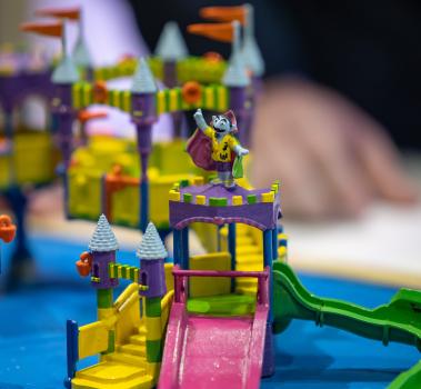 Close-up of scale model design of the customized RideHOUSEs waterplay area from ProSlides and SeaWorld seen at IAAPA Expo 2023