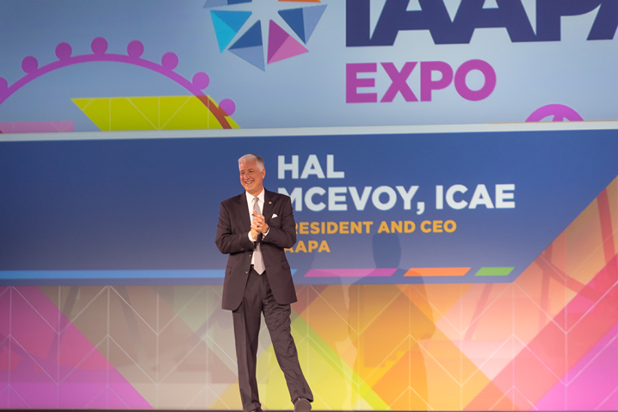 Hal McEvoy onstage at IAAPA Expo 