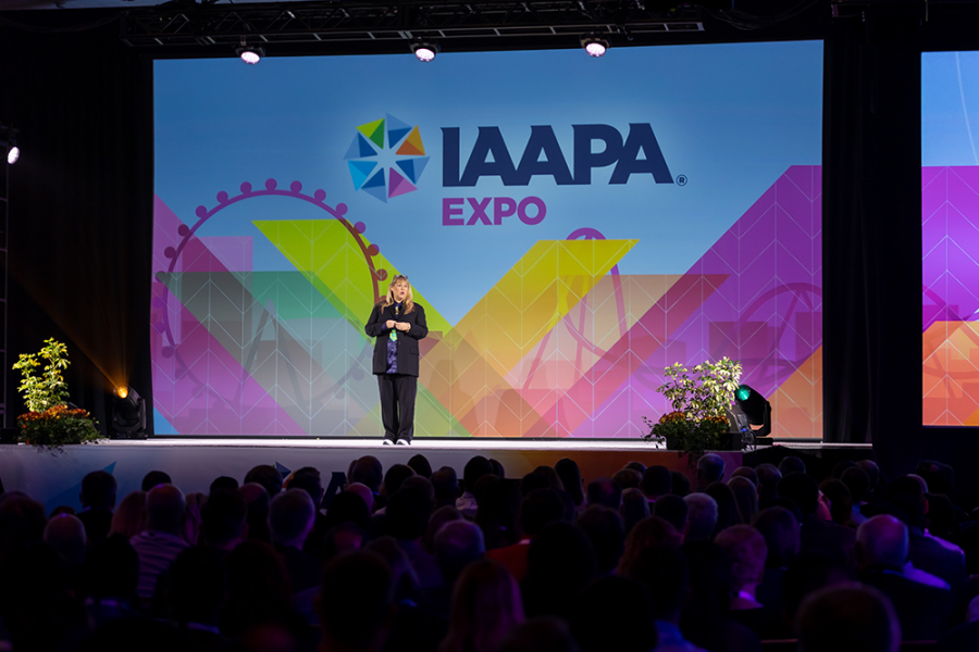 Amanda Thompson on stage at IAAPA Expo 
