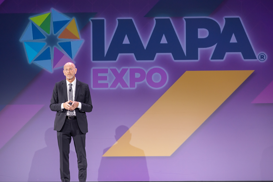 Ken Whiting on stage at IAAPA Expo 