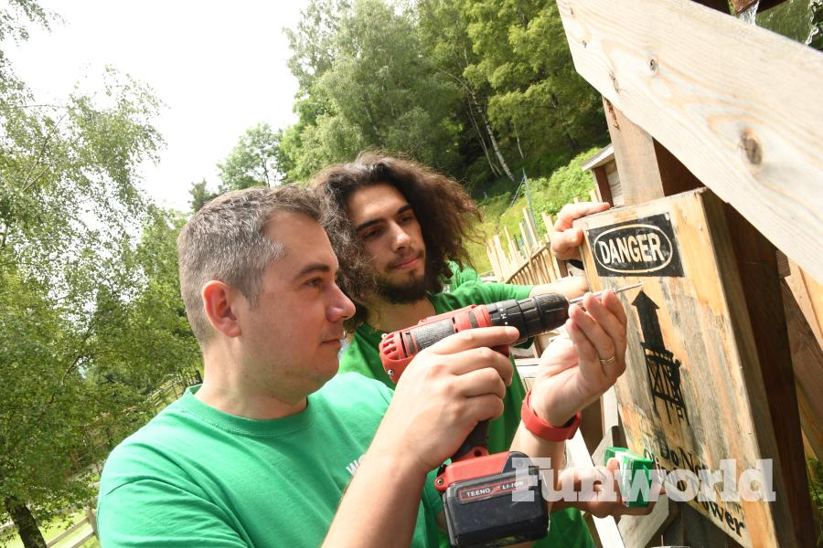 Man drills into wood