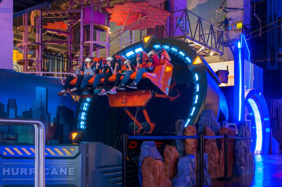 Guests are in the middle of riding Transformers Energy Surge inside Hasbro City FEC