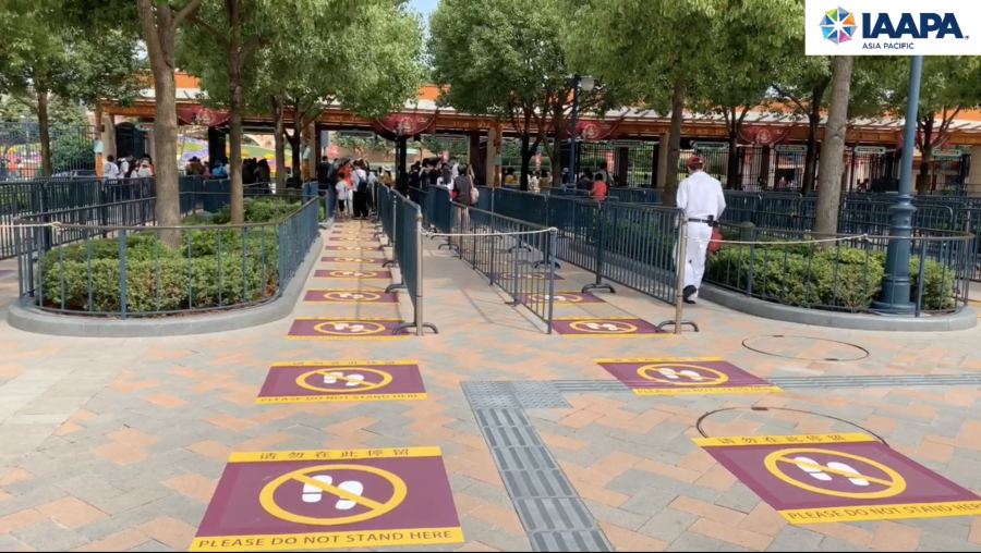 Decals marking where guests should not stand at entrance queue to Shanghai Disneyland