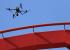 A drone performs an inspection of roller coaster track at Carowinds amusement park