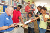 Mr. Bill introduces children at the Chattanooga Public Library to a Sinaloan Milk Snake