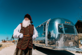 Santa at Skypark standing in front of an RV 